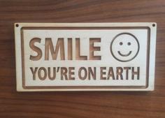 Laser Cut Smile – You’re On Earth (Laser Etched Sign)