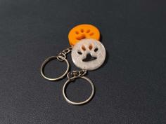 A Keychain With A Puppy Footprint 3D Printer Model