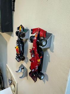 Rev Up Your Walls: Ultimate F1 Die Cast Hanging Mount! 3D Printer Model