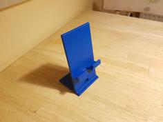 Phone Stand/Holder With Option For Charging 3D Printer Model