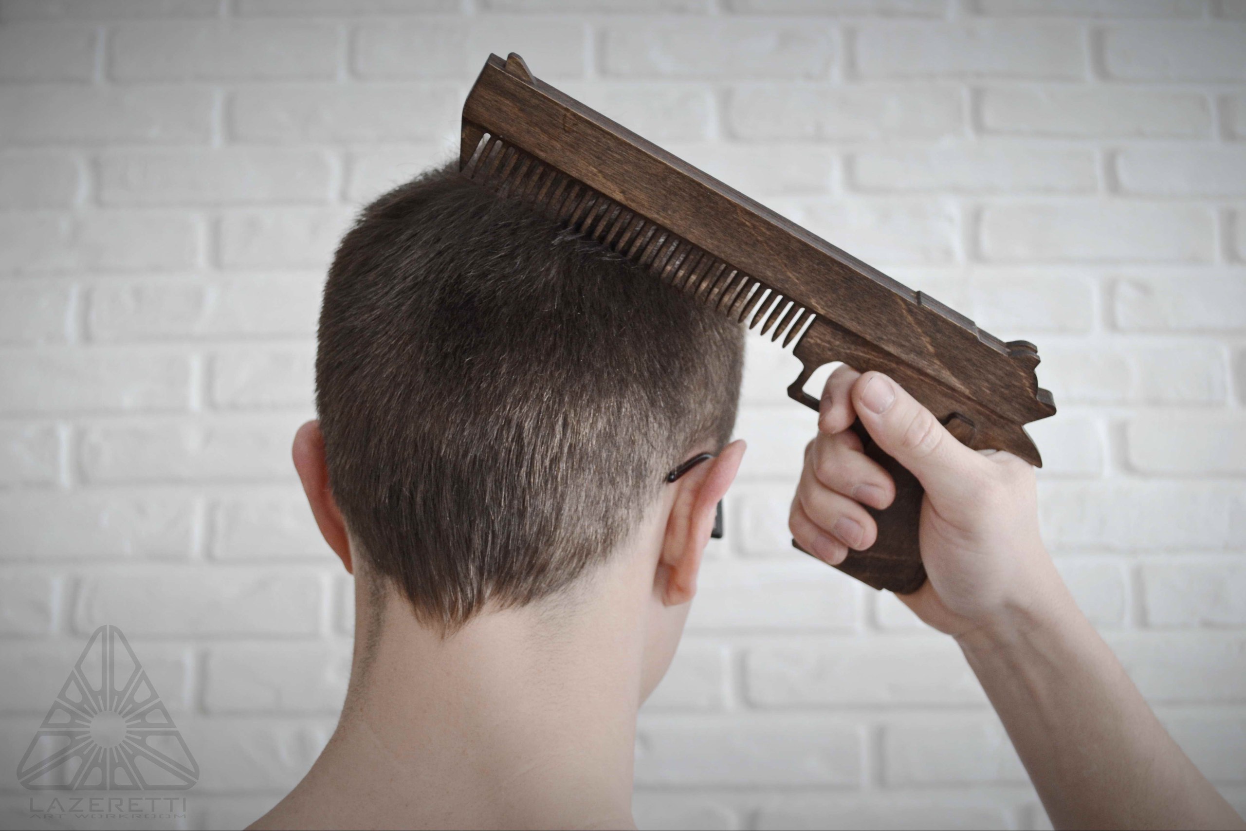 Laser Cut Gun Hair Comb Free Vector