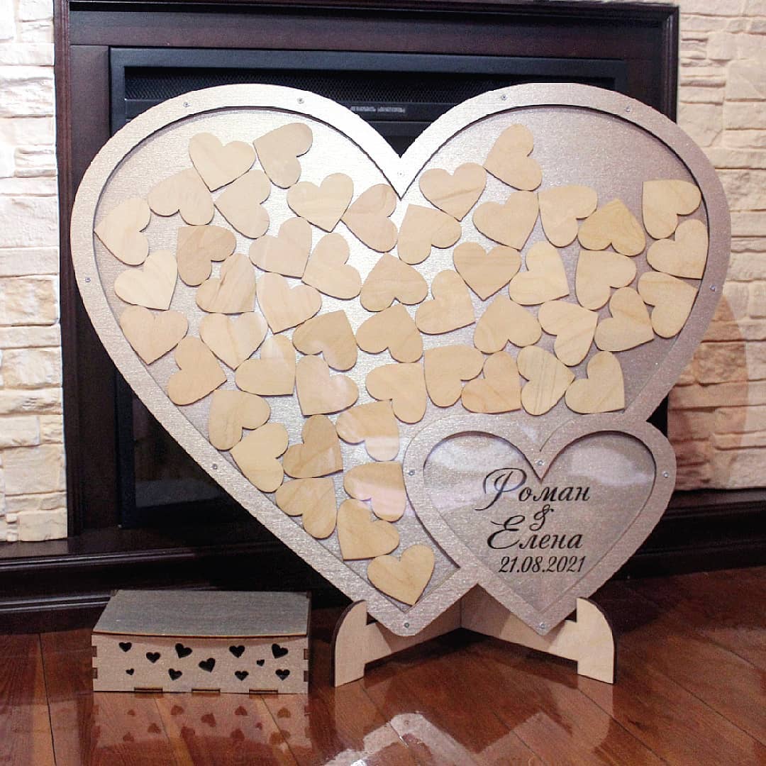 Libro de invitados de boda con marco de caja de gota en forma de corazón cortado con láser