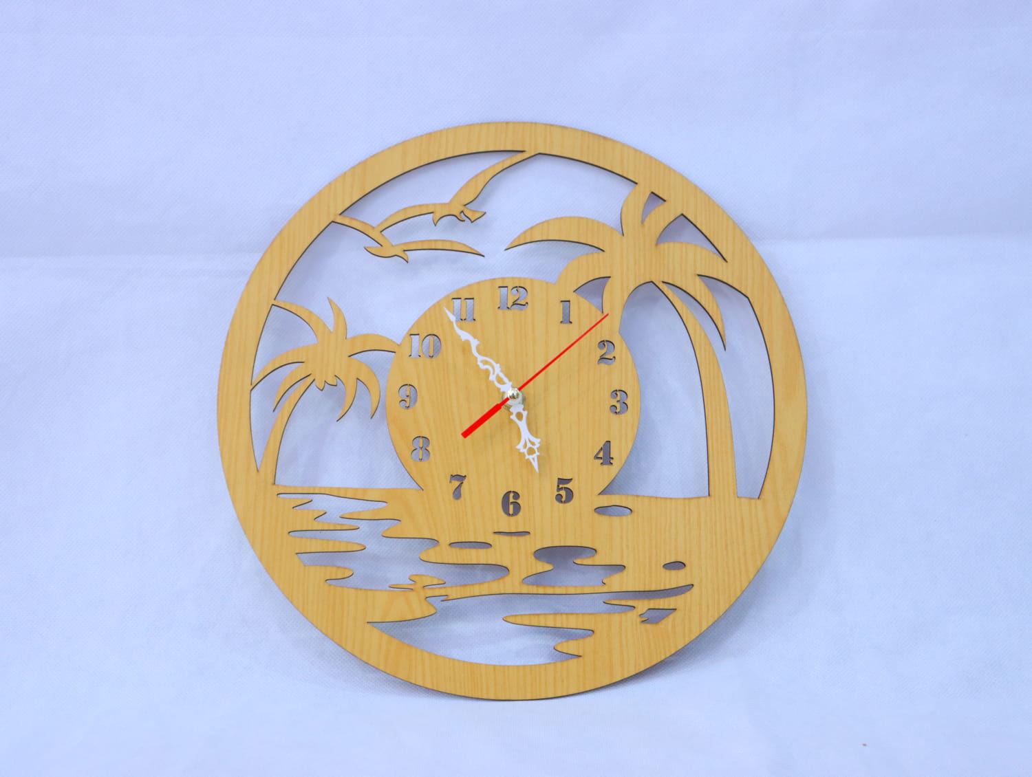 Laser Cut Wood Beach Wall Clock Free Vector