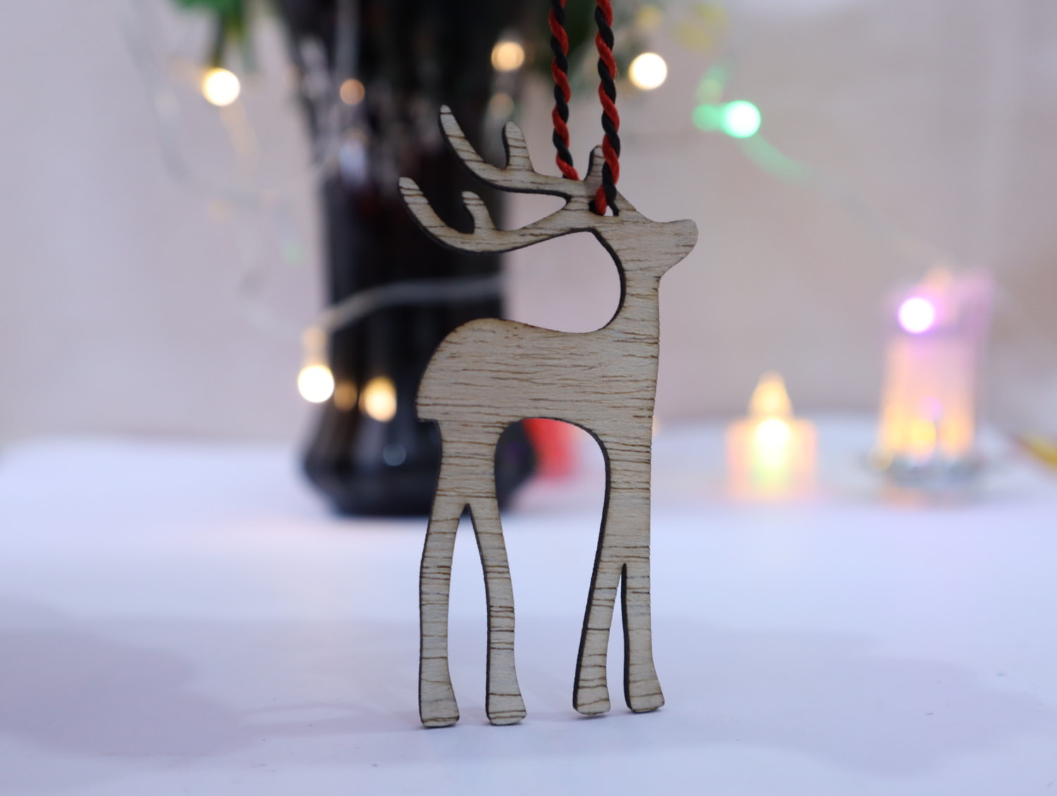 H1: Laser Cut Wooden Reindeer: An Enchanting Christmas Decoration