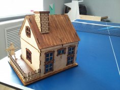 Лазерная резка шаблона деревянного дома с дымоходом