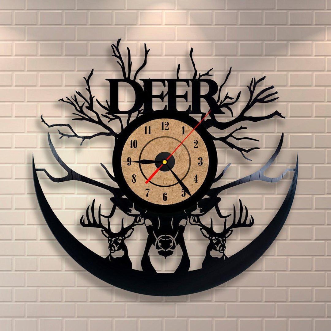 Reloj con disco de vinilo de ciervo cortado con láser