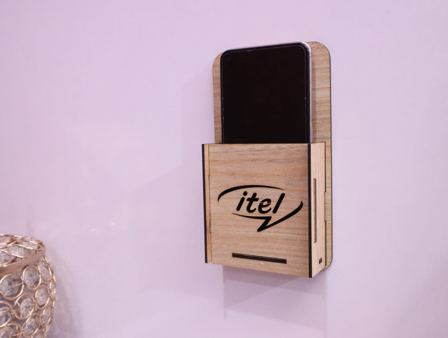 Laser Cut Wall Mounted Mobile Holder With Itel Logo Free Vector