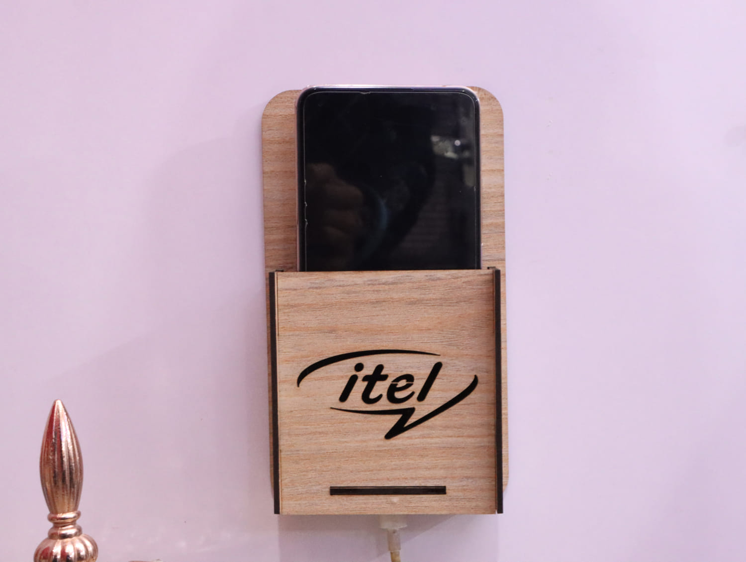 Laser Cut Wall Mounted Mobile Holder With Itel Logo Free Vector