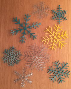 Laser Cut Christmas Snowflake Ornaments Free Vector