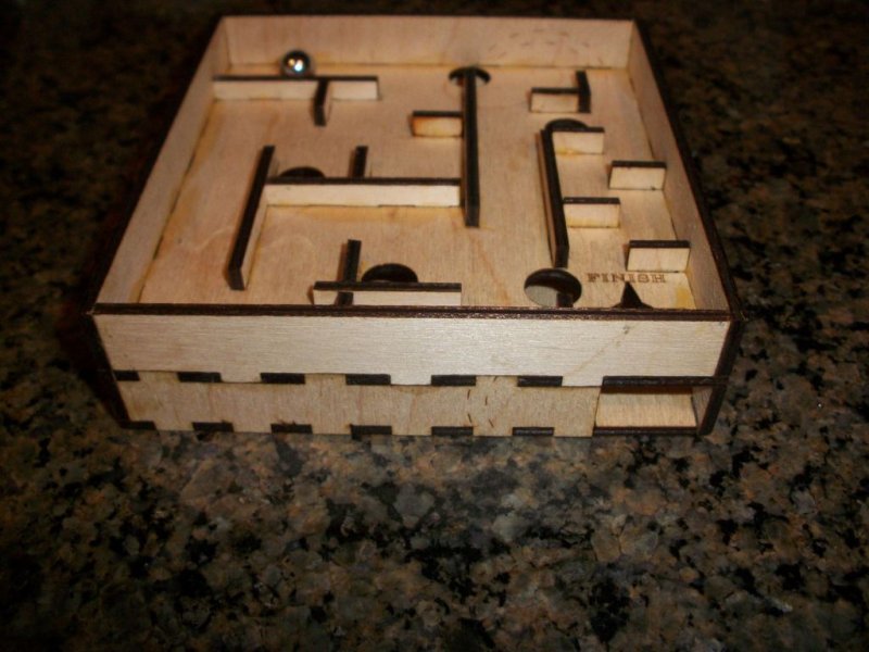 Laser Cut Handheld Marble Maze Free Vector