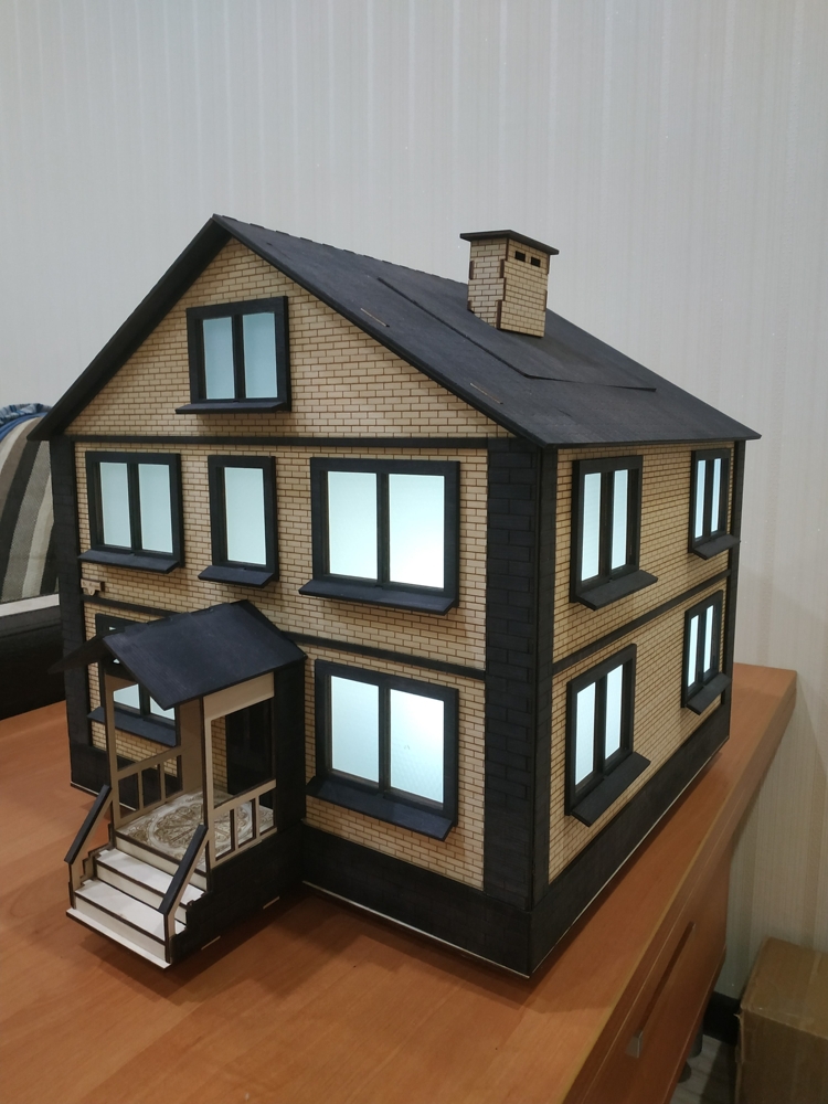 Modelo de casa de madeira cortada a laser