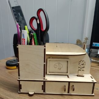 Laser Cut Desk Storage Organizer With Miniature Television Free Vector