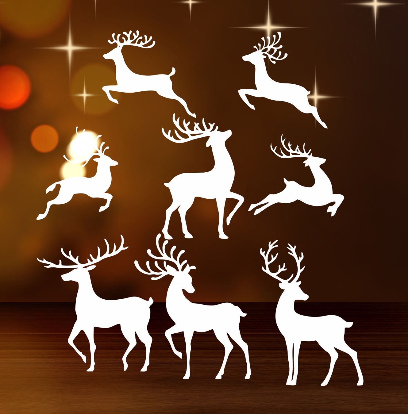 Лазерная резка рождественских оконных наклеек с оленями