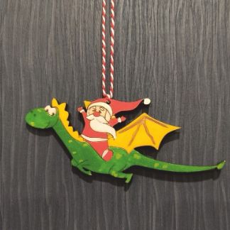 Laser Cut Santa Claus Riding Dragon Ornament Free Vector