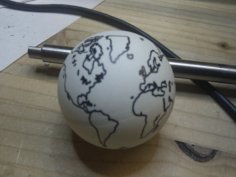 Laser Cut World On A Table Tennis Ball