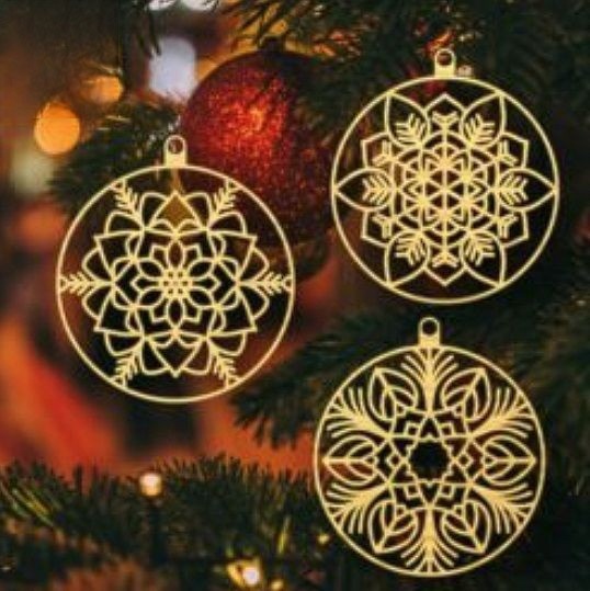 Laser Cut Christmas Snowflake Balls Free Vector