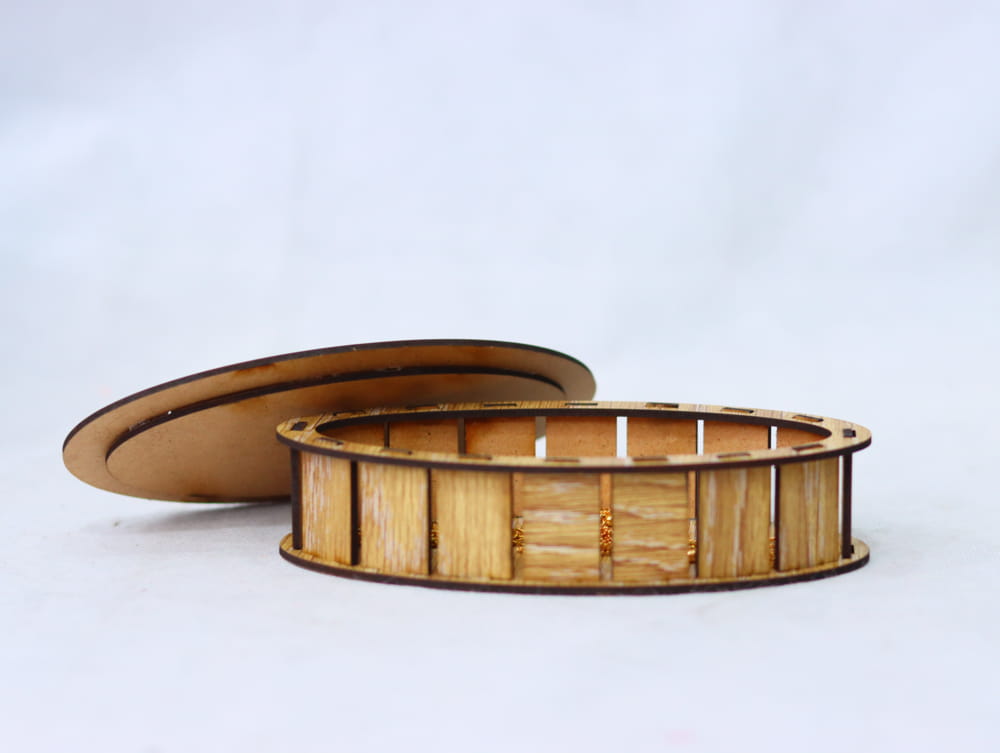 Laser Cut Oval Wooden Box Free Vector