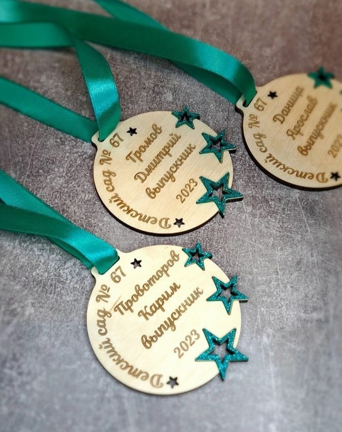 Laser Cut Wooden Event Medals Free Vector