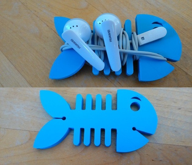 Soporte para auriculares con forma de pez cortado con láser