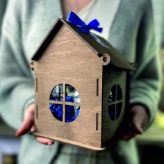 Caja de regalo con forma de casa cortada con láser