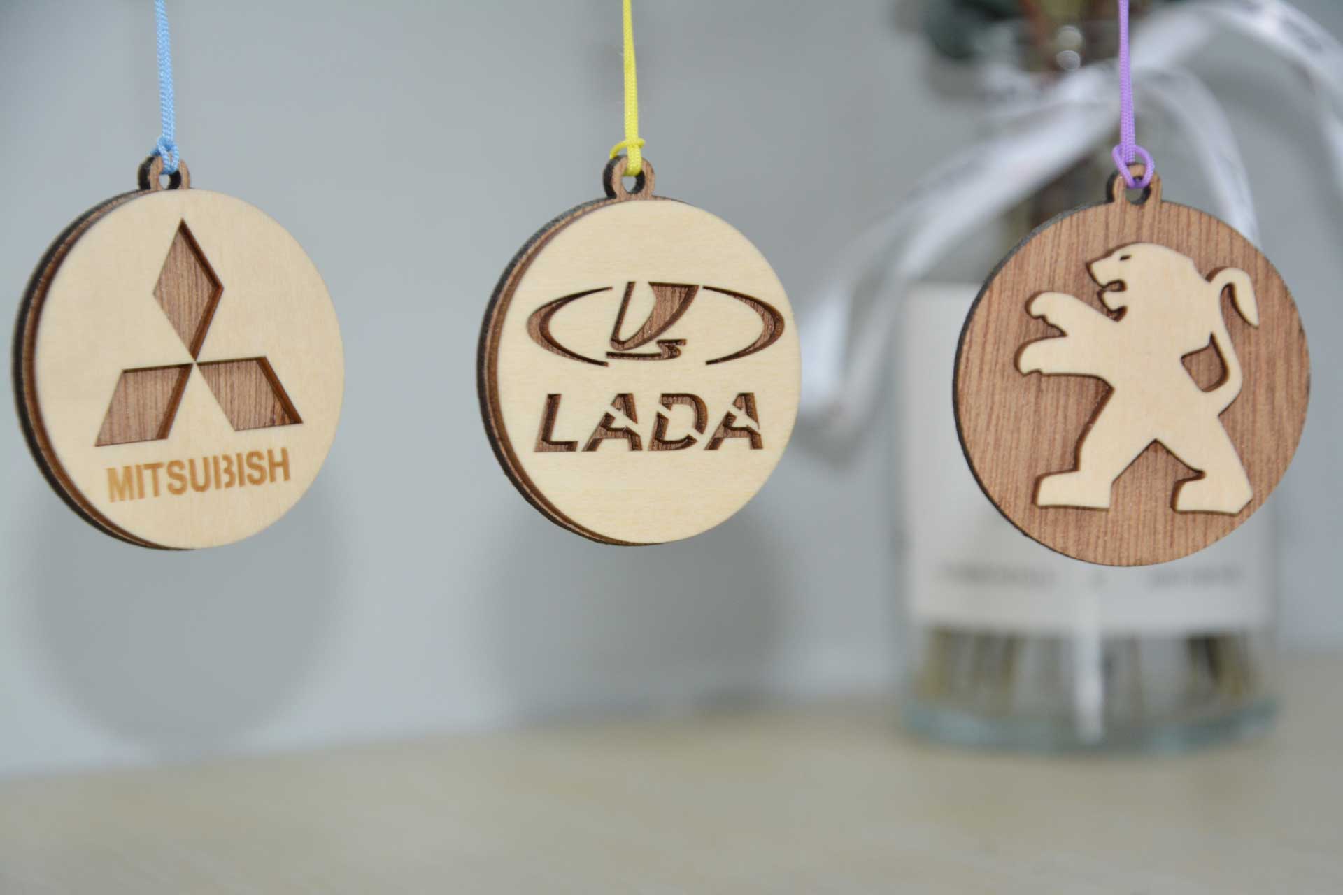 Laser Cut Car Logo Keychains Free Vector