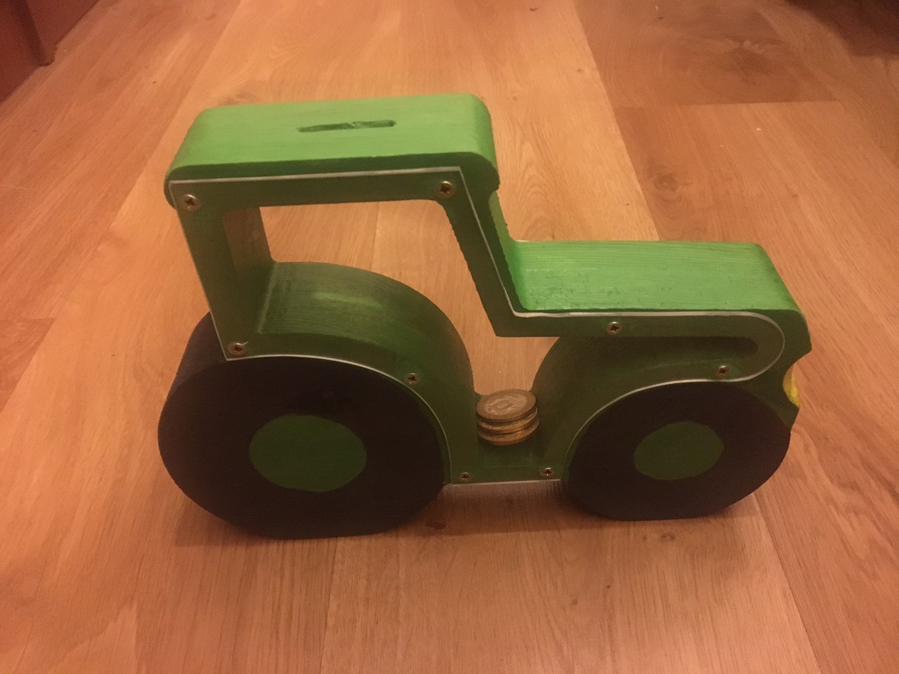 Lasergeschnittenes Traktor-Sparschwein