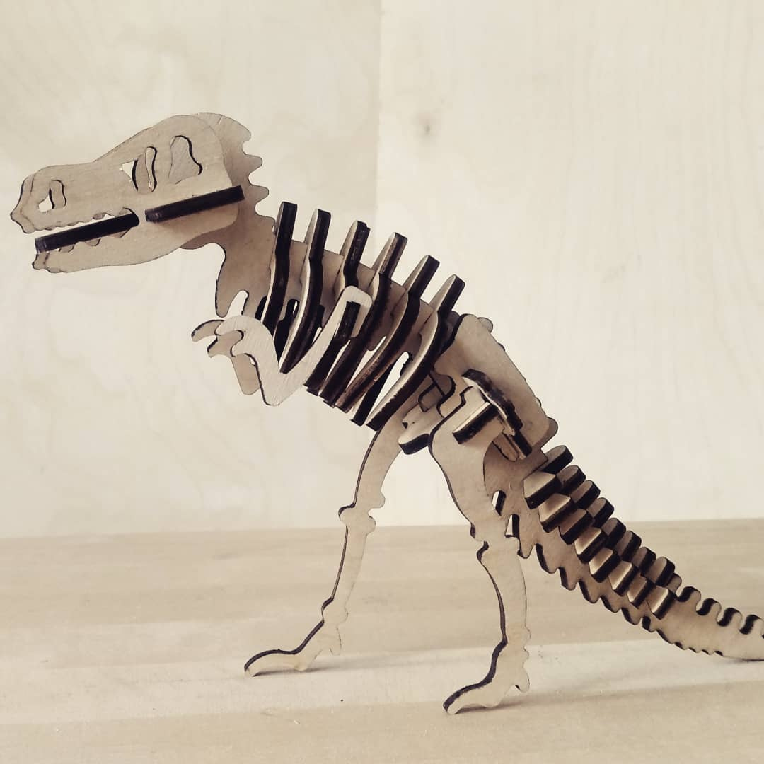 Quebra-cabeça de esqueleto de dinossauro de madeira cortado a laser