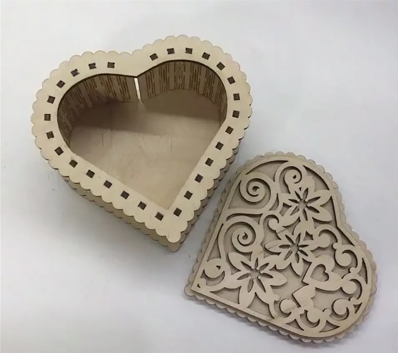 Modello di scatola a forma di cuore in compensato tagliato al laser