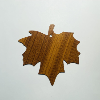 Laser Cut Wooden Maple Leaf Ornament Free Vector