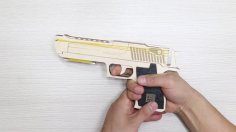 Pistola ad elastico tagliata al laser in compensato da 3 mm