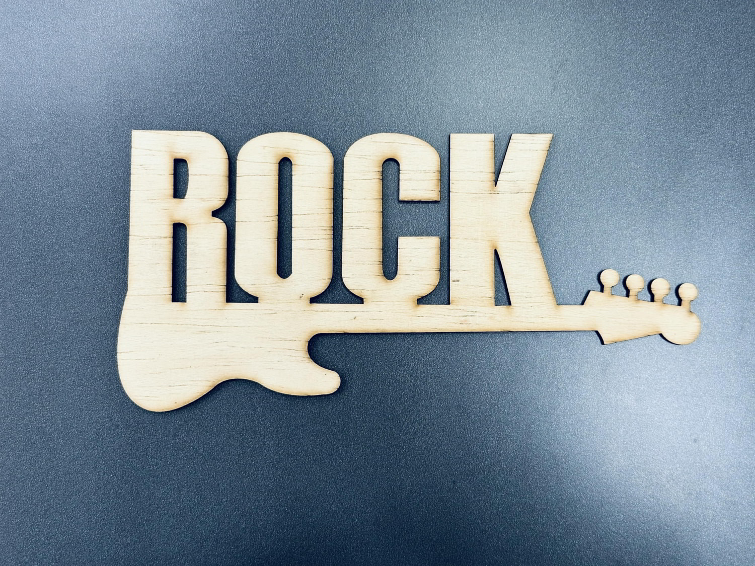 Laser Cut Word Rock With Guitar Band Wall Decor Free Vector