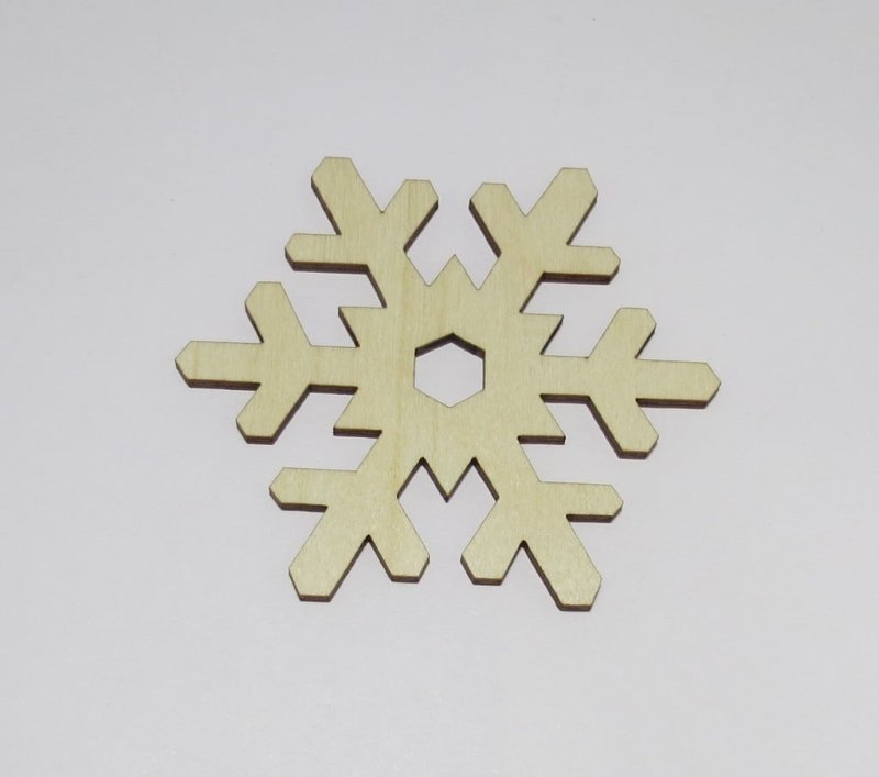 Laser Cut Snowflake Shaped Coasters Made of Birch Plywood