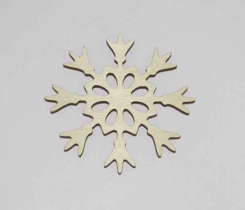 Laser Cut Snowflake Shaped Coasters Made of Birch Plywood