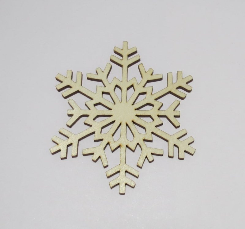 Laser Cut Snowflake Shaped Coasters Made of Birch Plywood