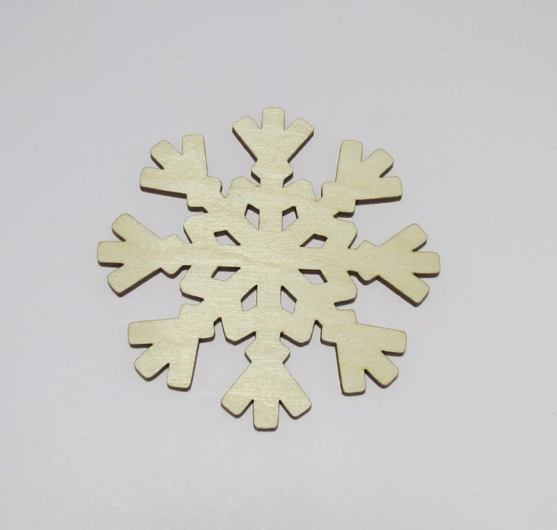 Laser Cut Snowflake Shaped Coasters Made of Birch Plywood