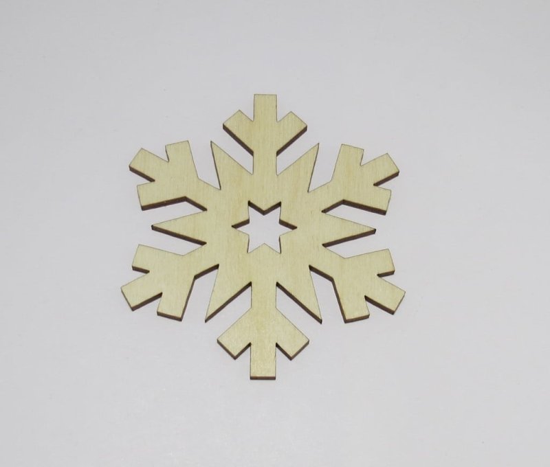 Laser Cut Snowflake Shaped Coasters Made of Birch Plywood