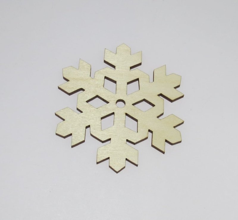 Laser Cut Snowflake Shaped Coasters Made of Birch Plywood