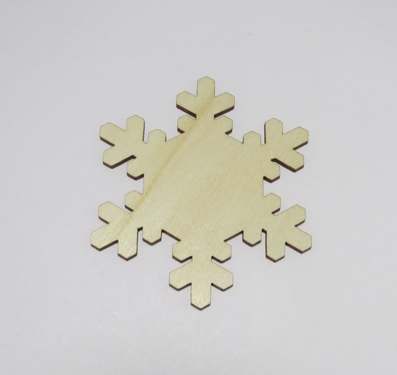 Laser Cut Snowflake Shaped Coasters Made of Birch Plywood