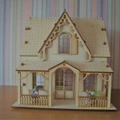 Casa modelo de madera cortada con láser
