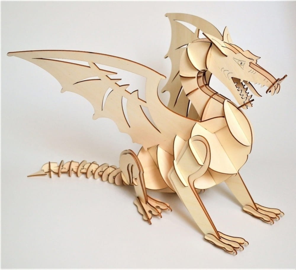 Laser Cut Dragon With Moving Tail Free Vector
