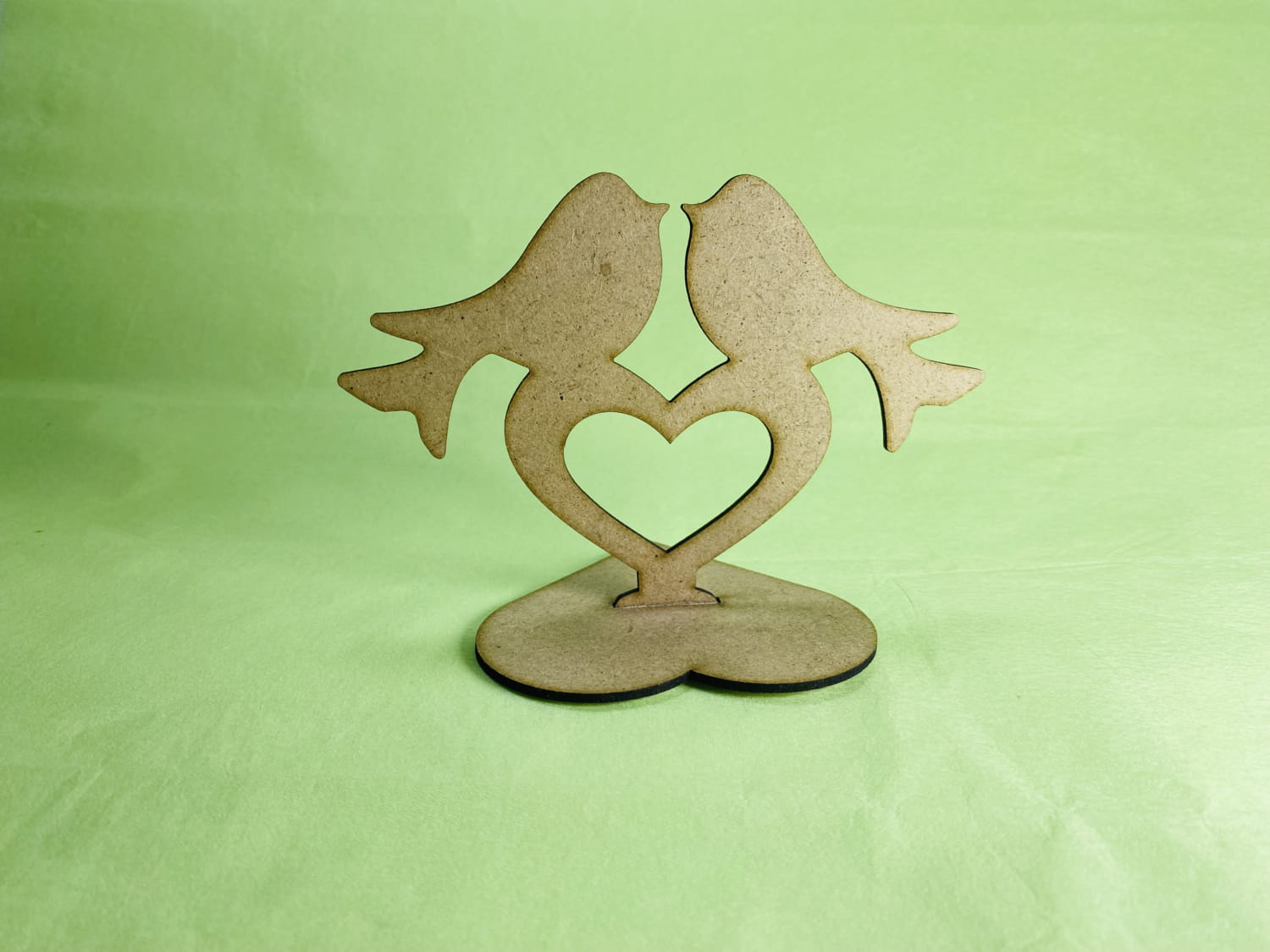 Laser Cut Love Birds On Heart Stand Free Vector