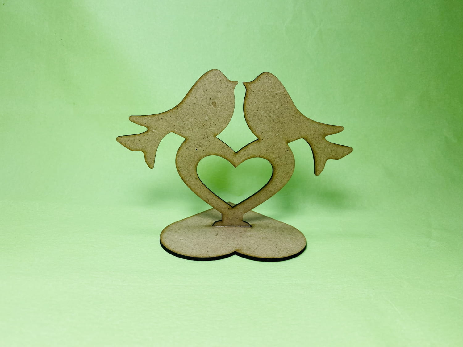 Laser Cut Love Birds On Heart Stand Free Vector