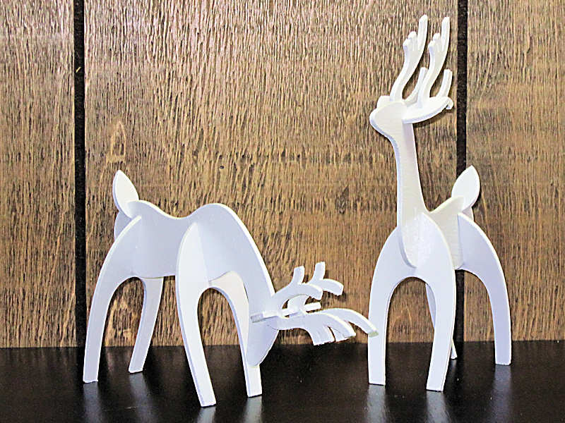 Laserowo wycinana dekoracja stołu z jelenia