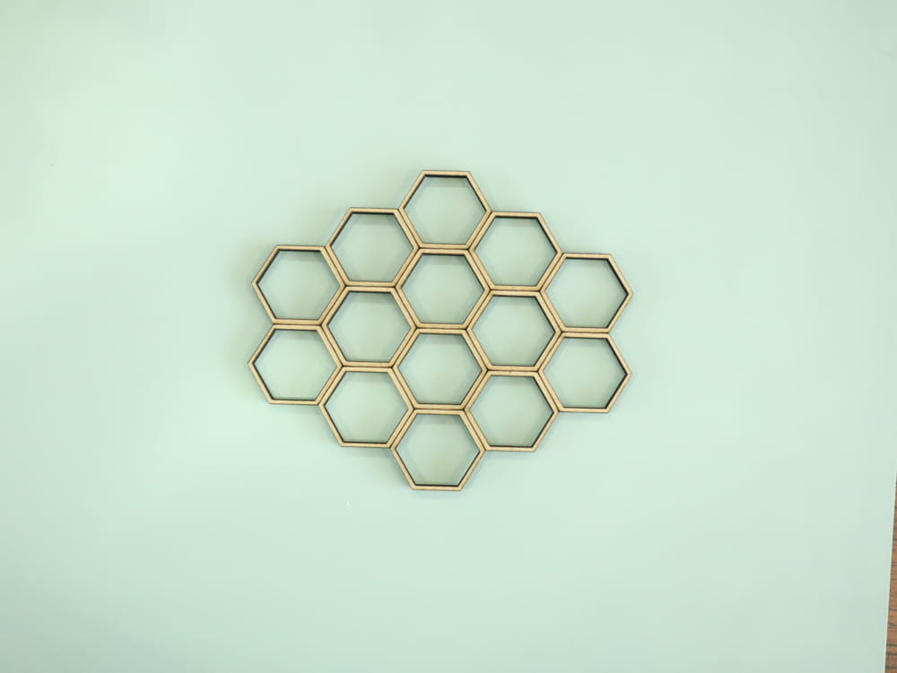 Laser Cut Honeycomb Pattern Wooden Wall Decor Free Vector